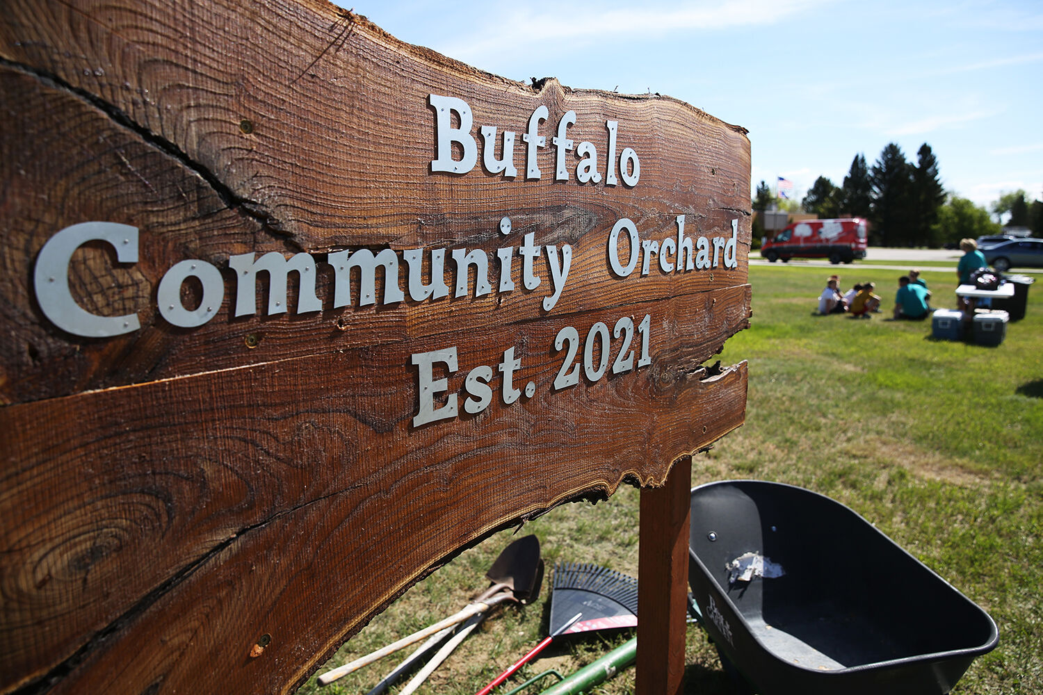 The official orchard sign is made from the Russian Olives